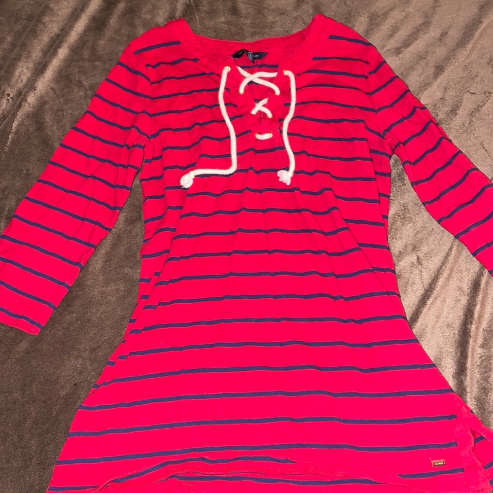 Red and navy blue striped Tommy Hilfiger shirt .